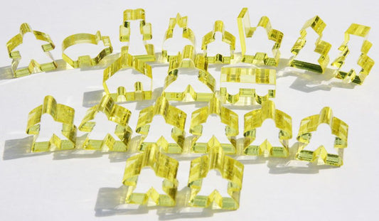 Complete 19 piece yellow transparent set of Carcassonne meeples