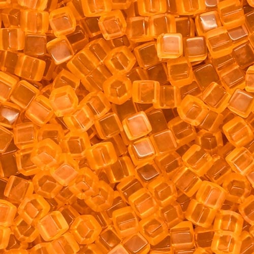 Orange translucent plastic cube